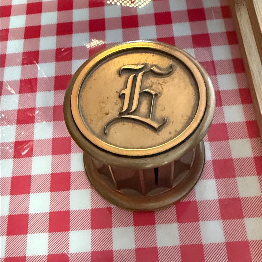 Gold Monogrammed Decorative Piece